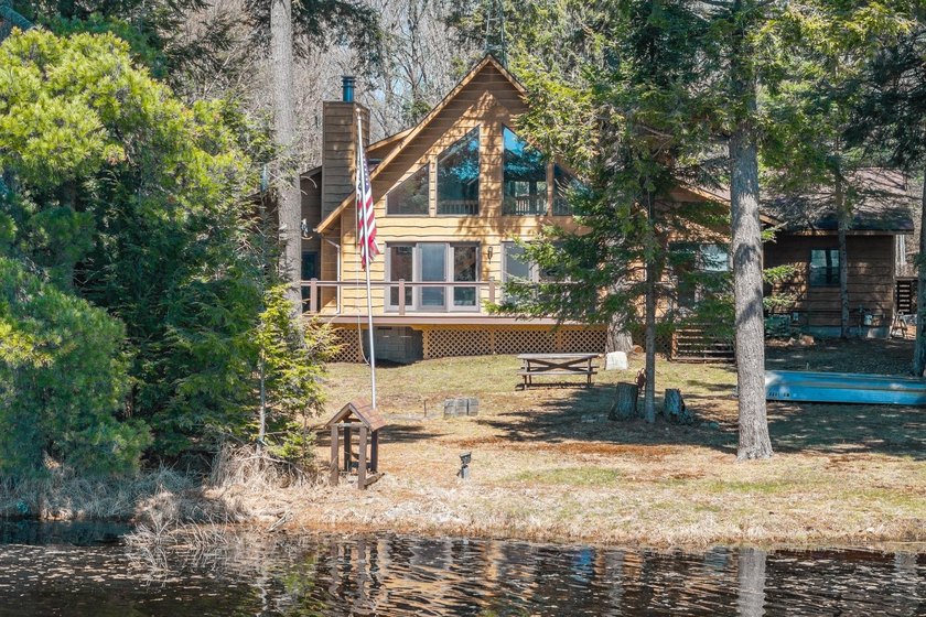 Exquisitely renovated, south-facing chalet-style lakefront - photo 26