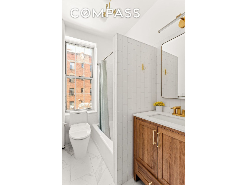 Welcome to 37-51 84th Street #21, a spacious junior-four - photo 6