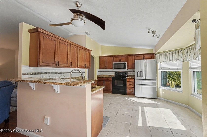 Nestled in the desirable NW Palm Bay community on a fully fenced - photo 9