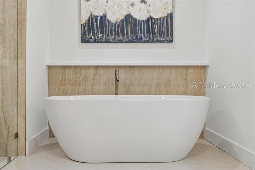 Welcome to this beautifully reimagined luxury residence in the - photo 21