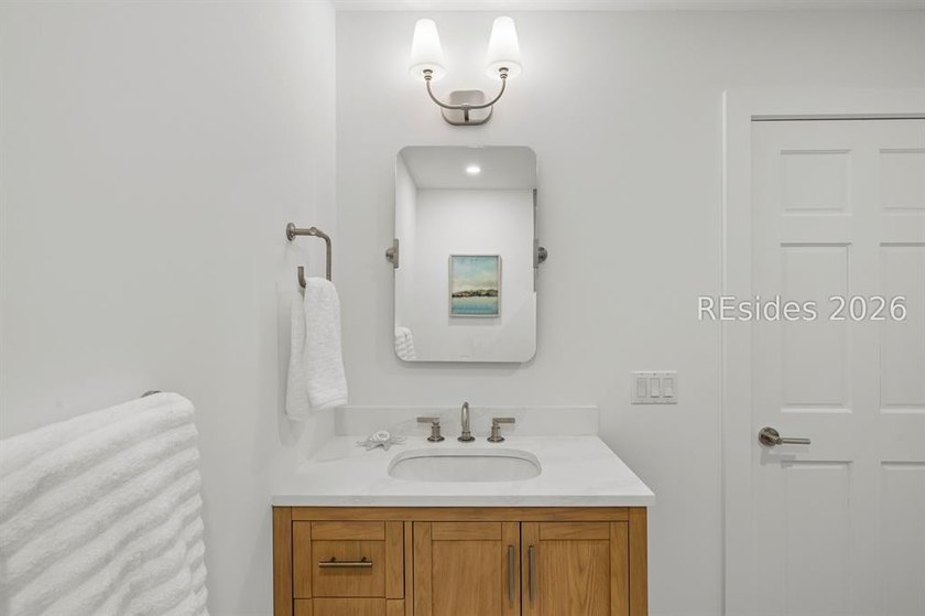 Welcome to this beautifully reimagined luxury residence in the - photo 30