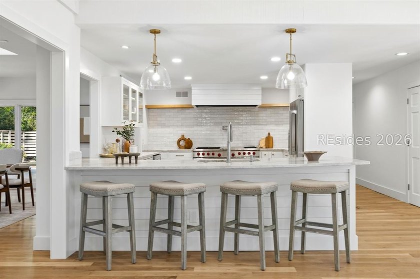 Welcome to this beautifully reimagined luxury residence in the - photo 40