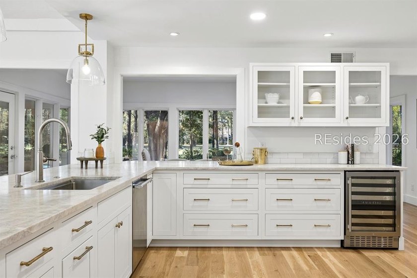 Welcome to this beautifully reimagined luxury residence in the - photo 41