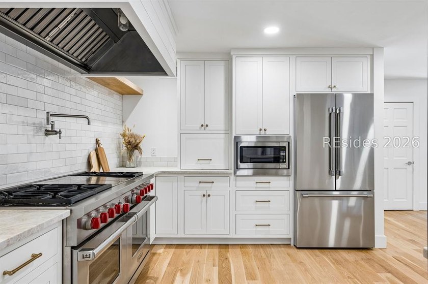 Welcome to this beautifully reimagined luxury residence in the - photo 46