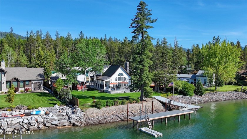 Where mountain views meet riverfront living, this exceptional - photo 4