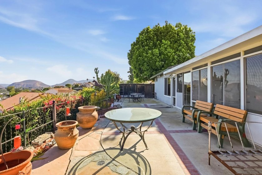 Perched at the top of the hill in Del Cerro, this single-story 4 - photo 32