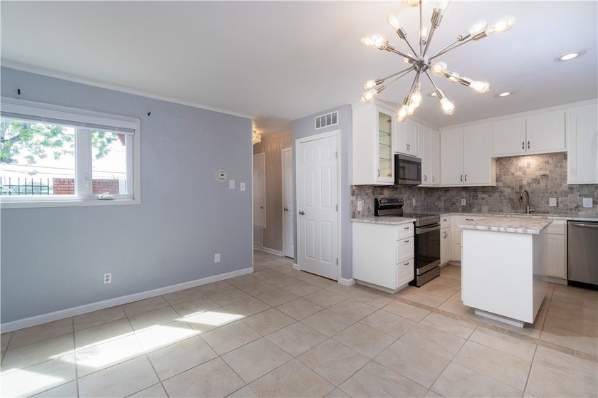 This beautifully renovated townhome is centrally located in - photo 11