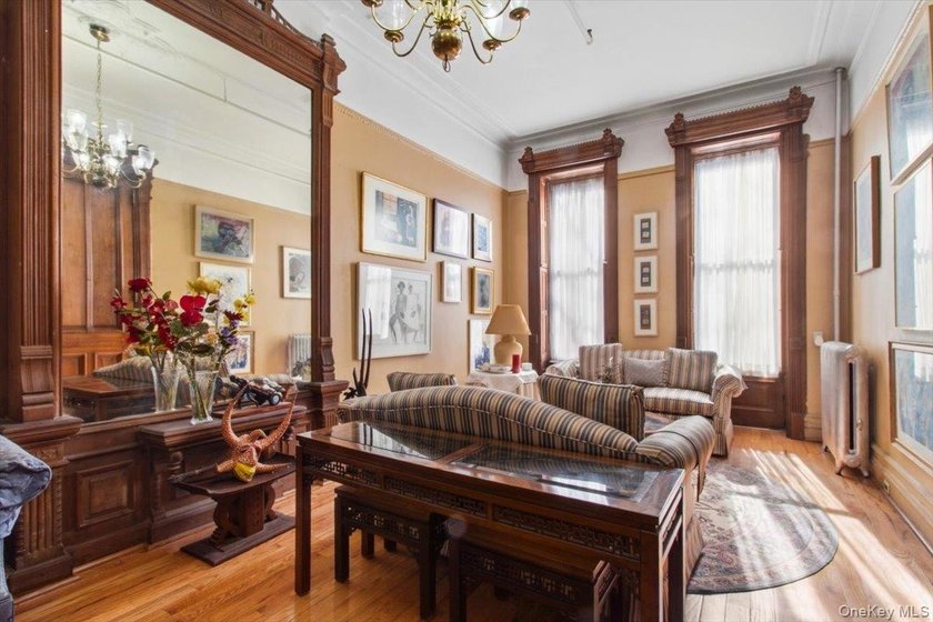 This meticulously maintained residence offers a spacious - photo 8