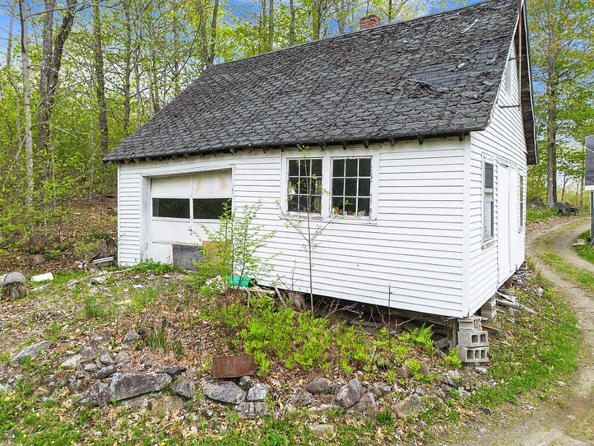 Here's an opportunity to build equity and enjoy Togus Pond. This - photo 12