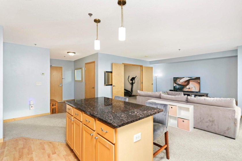 Welcome to unit #702! This top-floor unit offers an open concept - photo 6