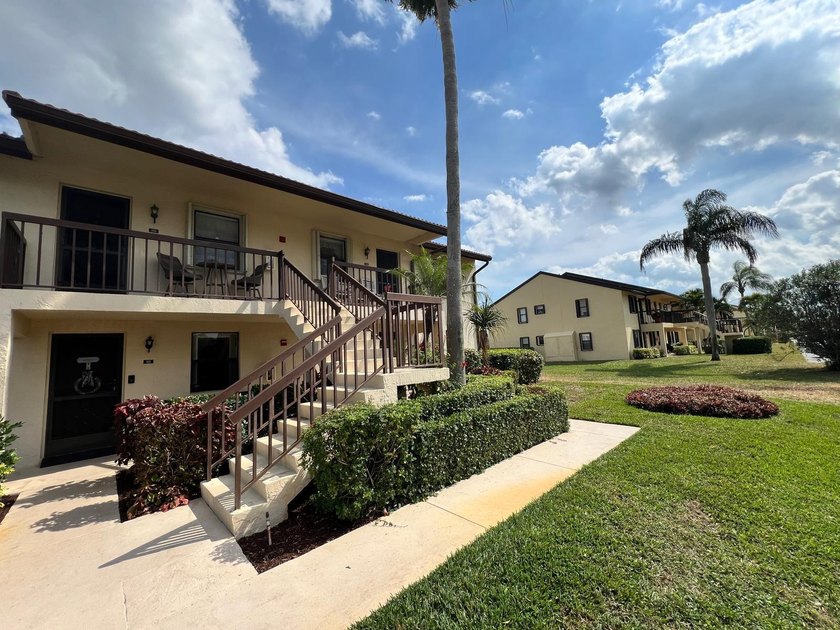 LOCATION IS THE KEY! NESTLED IN A VIBRANT 55+ COMMUNITY, THIS - photo 2