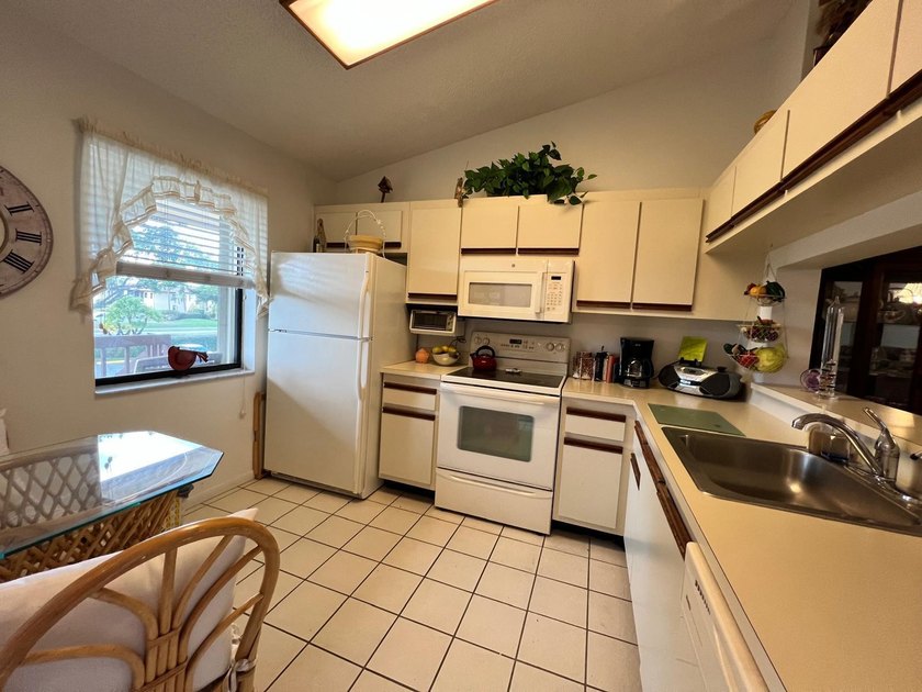 LOCATION IS THE KEY! NESTLED IN A VIBRANT 55+ COMMUNITY, THIS - photo 6