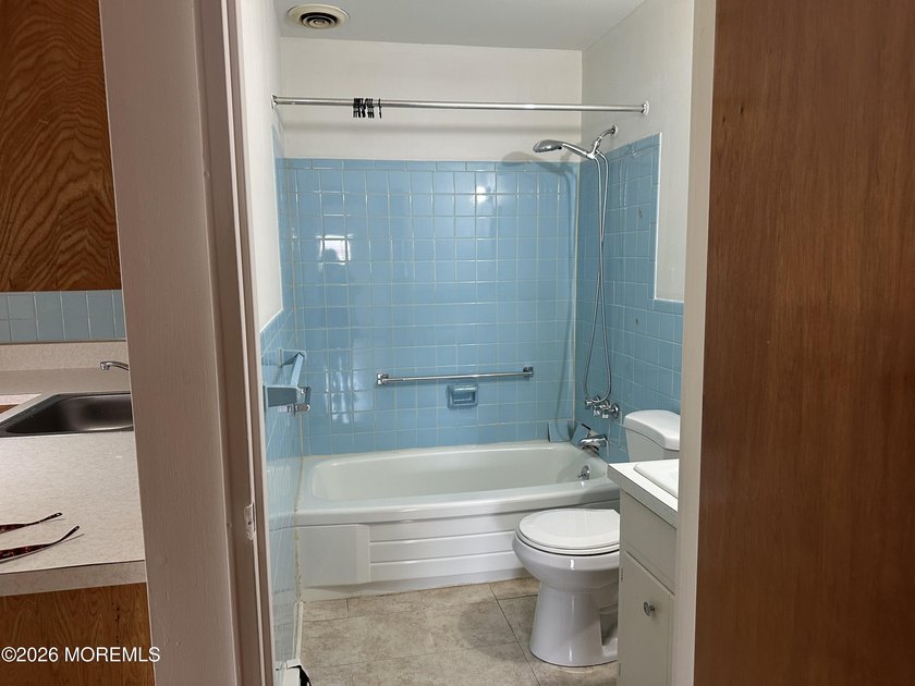 Beautifully maintained 920 sq. ft. quad model featuring freshly - photo 12