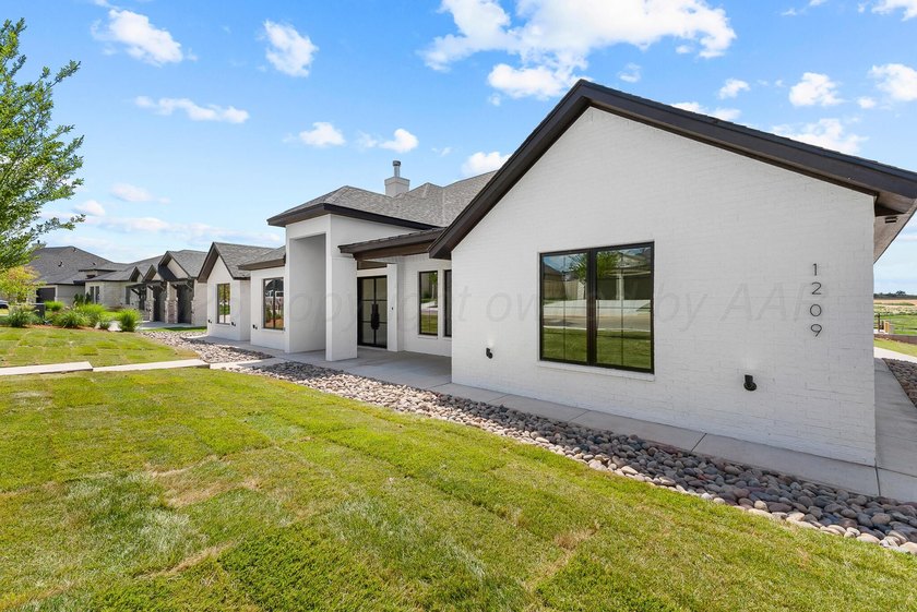 Welcome to 1209 Herring Ranch Road, a stunning custom home by - photo 3