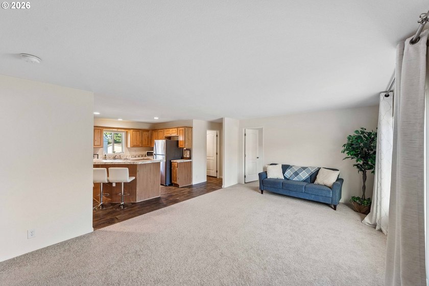 This move-in-ready home offers three bedrooms, twOpo bathrooms - photo 4