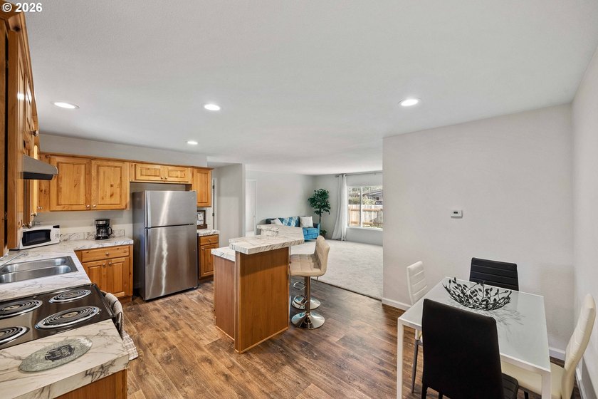This move-in-ready home offers three bedrooms, twOpo bathrooms - photo 8