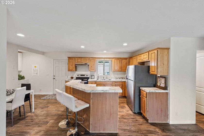 This move-in-ready home offers three bedrooms, twOpo bathrooms - photo 9