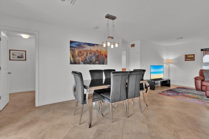 Beautifully maintained 3 BR, 2.5 BA waterfront home with 94' of - photo 11