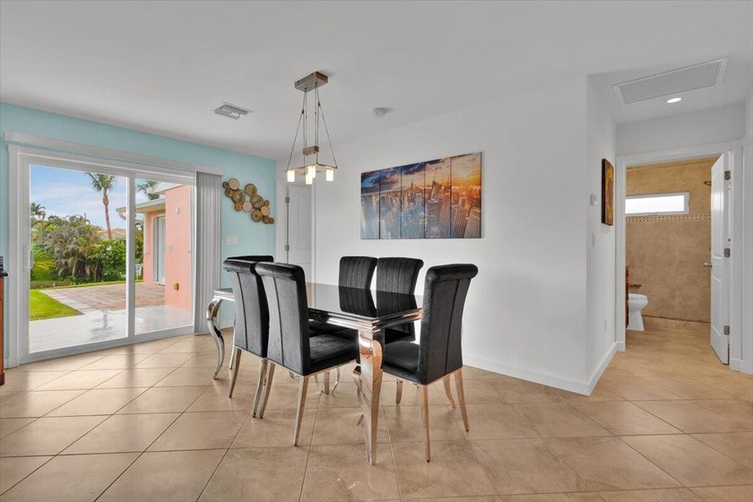 Beautifully maintained 3 BR, 2.5 BA waterfront home with 94' of - photo 12