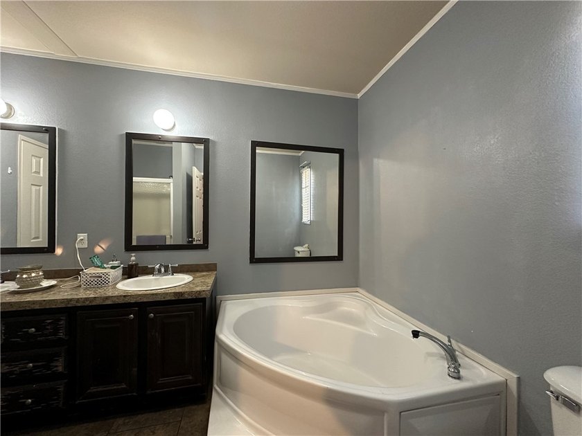 Welcome to this well-maintained 3-bedroom, 2-bath mobile home - photo 14