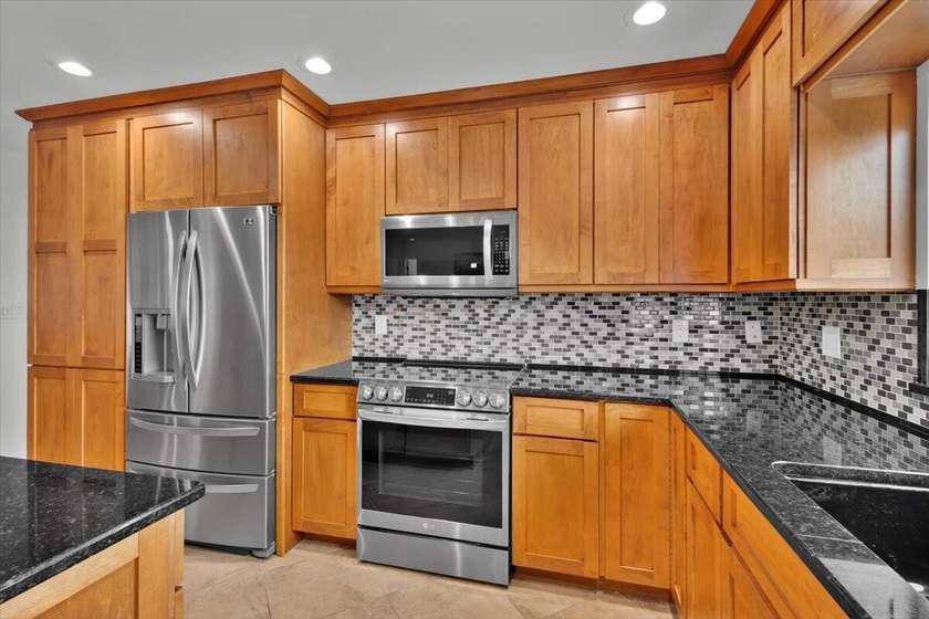 Beautifully maintained 3 BR, 2.5 BA waterfront home with 94' of - photo 14