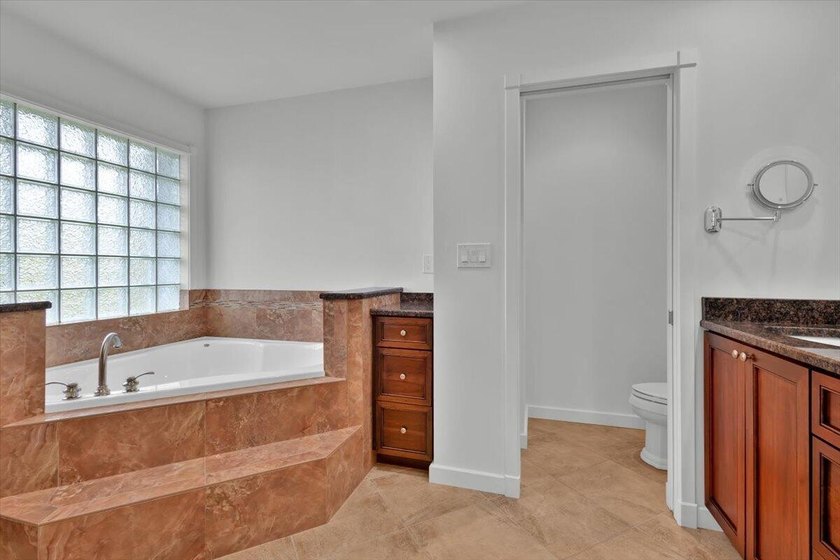 Beautifully maintained 3 BR, 2.5 BA waterfront home with 94' of - photo 32