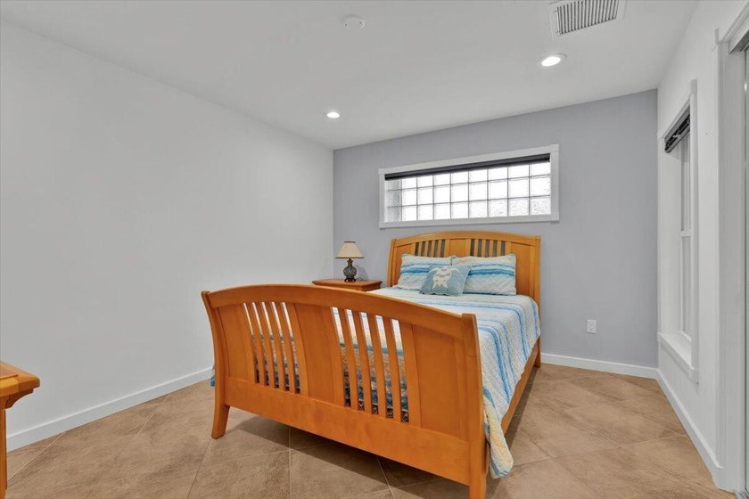 Beautifully maintained 3 BR, 2.5 BA waterfront home with 94' of - photo 41