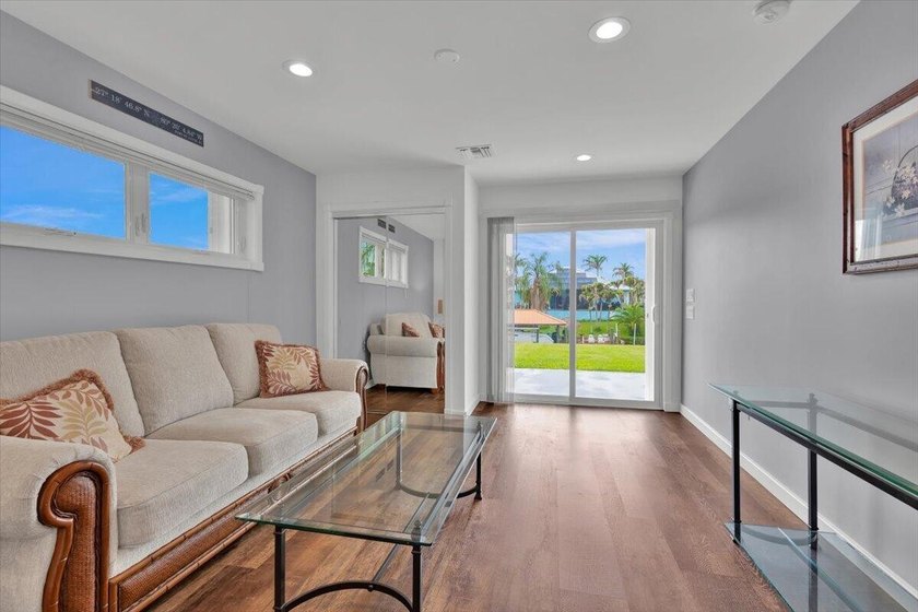 Beautifully maintained 3 BR, 2.5 BA waterfront home with 94' of - photo 48