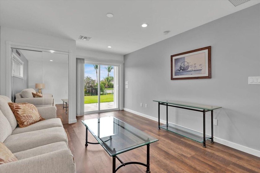 Beautifully maintained 3 BR, 2.5 BA waterfront home with 94' of - photo 50