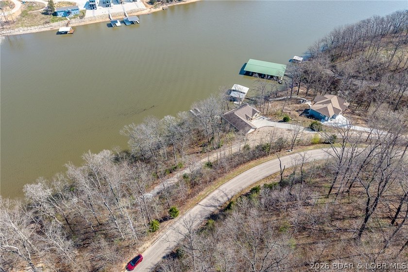 Lake Front lot ready for your dream home build! Located at the - photo 12