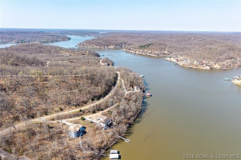 Lake Front lot ready for your dream home build! Located at the - photo 15