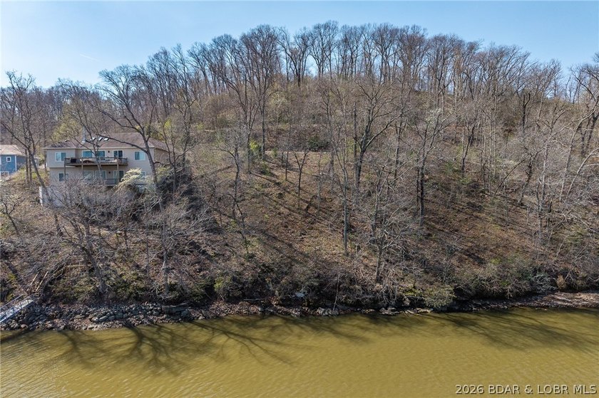 Lake Front lot ready for your dream home build! Located at the - photo 17