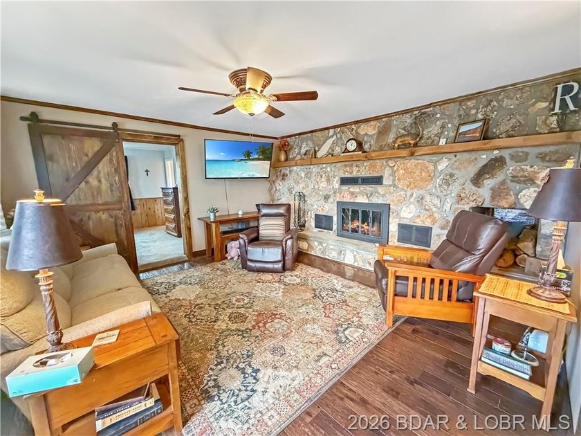 Lake of the Ozarks waterfront property featuring natural stone - photo 12