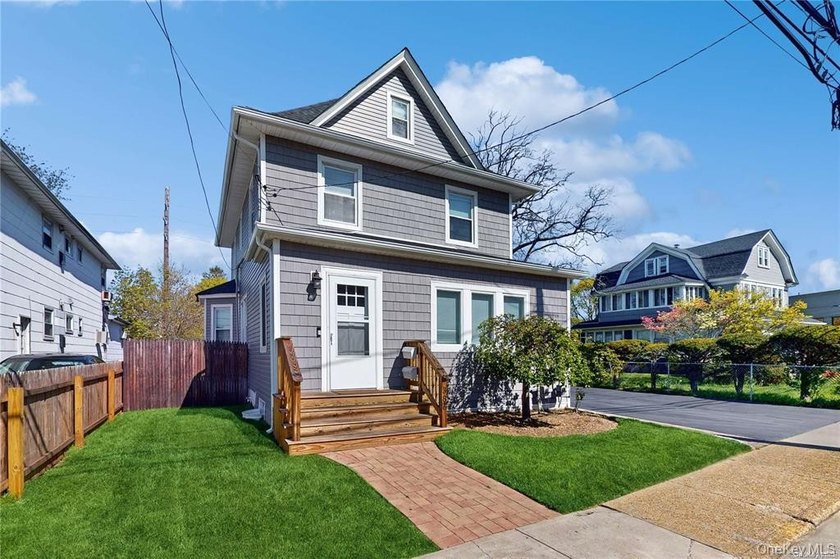 Beautiful Legal Two-Family Home, Also Works Seamlessly As A - photo 2