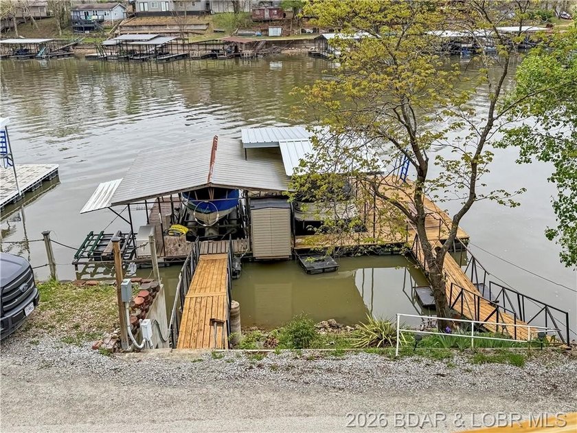 Lake of the Ozarks waterfront property featuring natural stone - photo 32