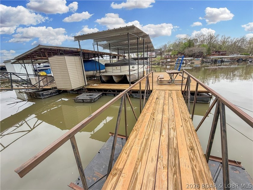 Lake of the Ozarks waterfront property featuring natural stone - photo 33