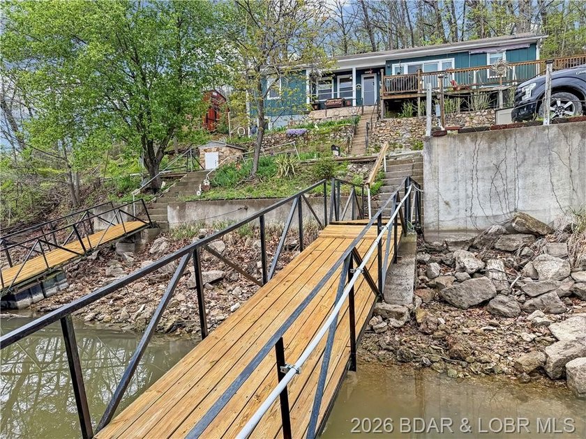 Lake of the Ozarks waterfront property featuring natural stone - photo 43