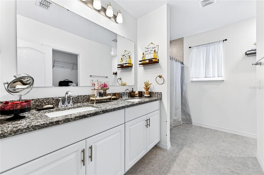 Step into this like-new 2021 concrete-block home featuring 4 - photo 22