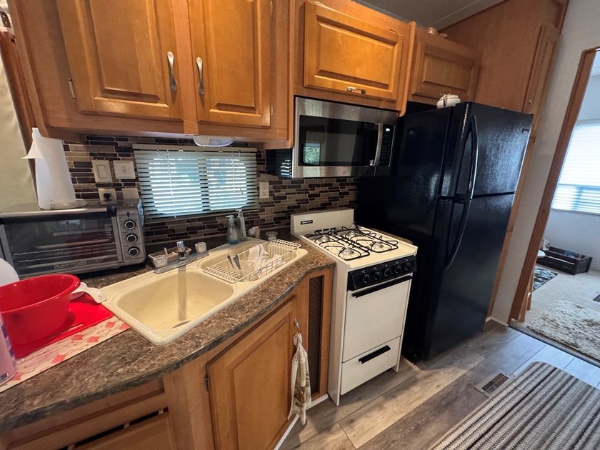 Cleared lot with stone down. Two bedroom one bathroom park - photo 8