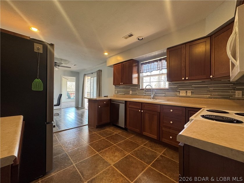 Set on nearly 5 acres, this property offers the rare blend of - photo 11