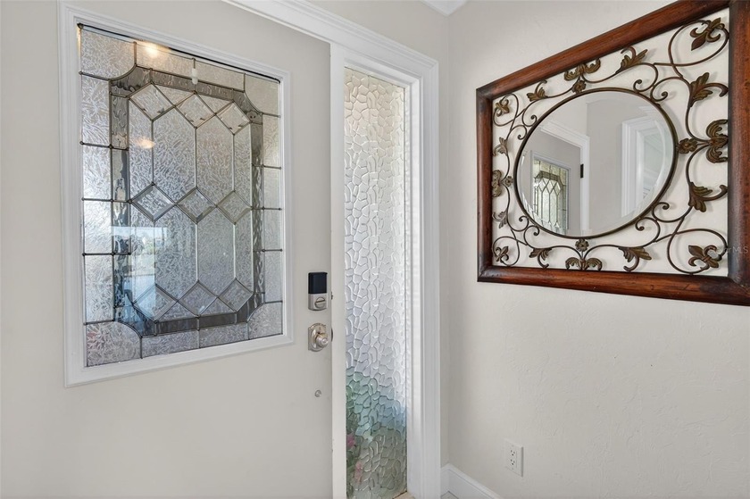 NOW OFFERED FURNISHED! Fully remodeled waterfront villa located - photo 9