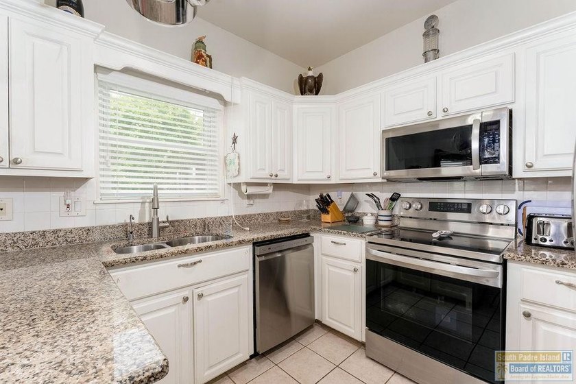 Enjoy peaceful golf course living in this well-maintained - photo 11