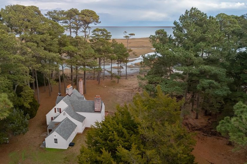 Welcome to this 2,035 sq ft seaside retreat! Discover the - photo 2