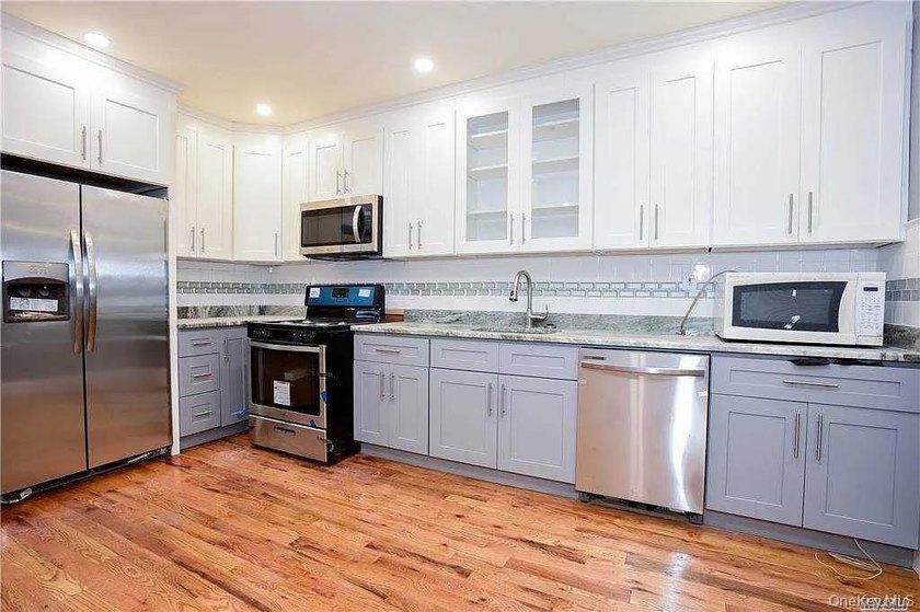 Amazing Turn Key 2 family renovated brick building with 2nd - photo 3
