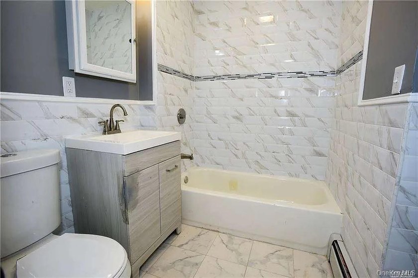 Amazing Turn Key 2 family renovated brick building with 2nd - photo 8