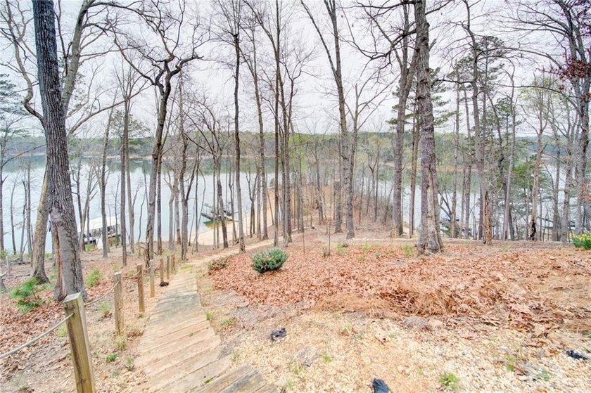 Escape to a world where luxury meets the water's edge. Nestled - photo 50