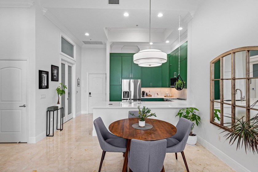 Fully upgraded 2 bed 2 bath plus a den! This stunning 5th-floor - photo 2