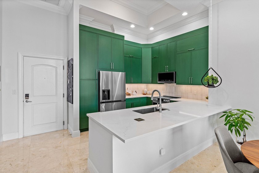 Fully upgraded 2 bed 2 bath plus a den! This stunning 5th-floor - photo 3