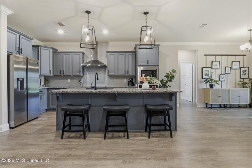 Step into this stunning 5-bedroom, 3-bathroom home offering the - photo 18
