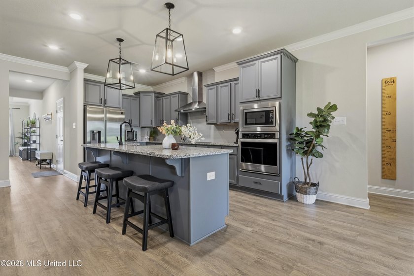 Step into this stunning 5-bedroom, 3-bathroom home offering the - photo 19